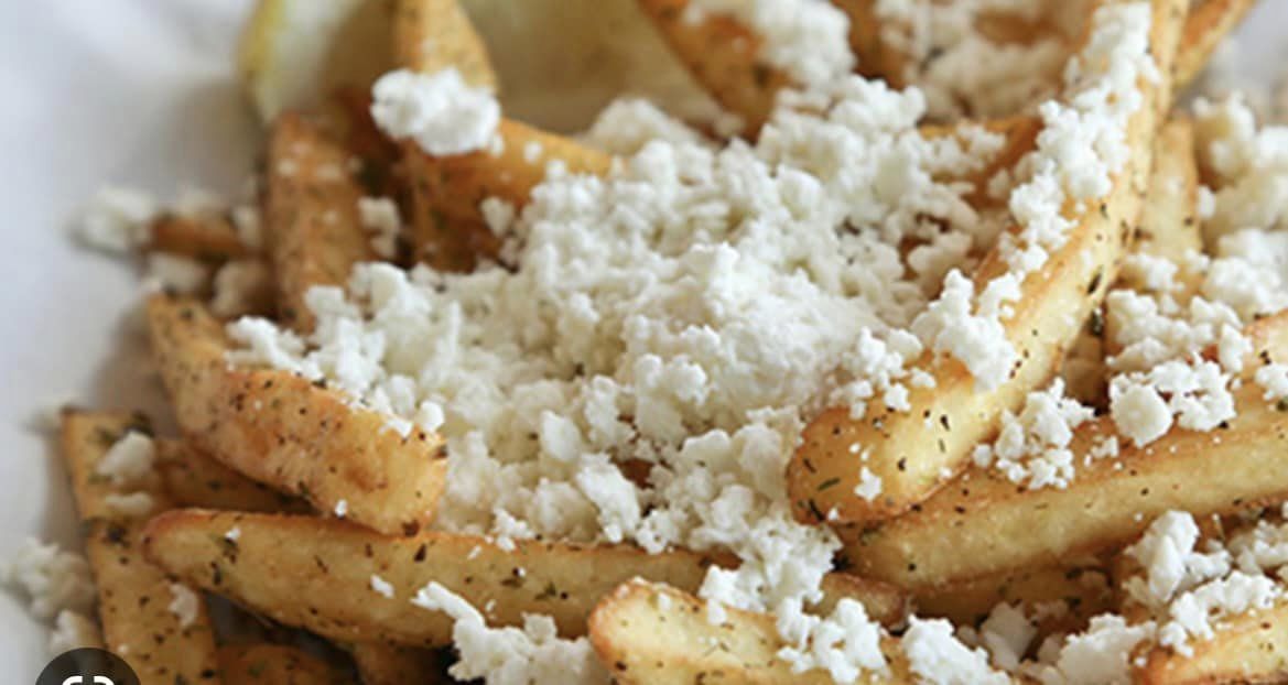 Fries with feta cheese topping
